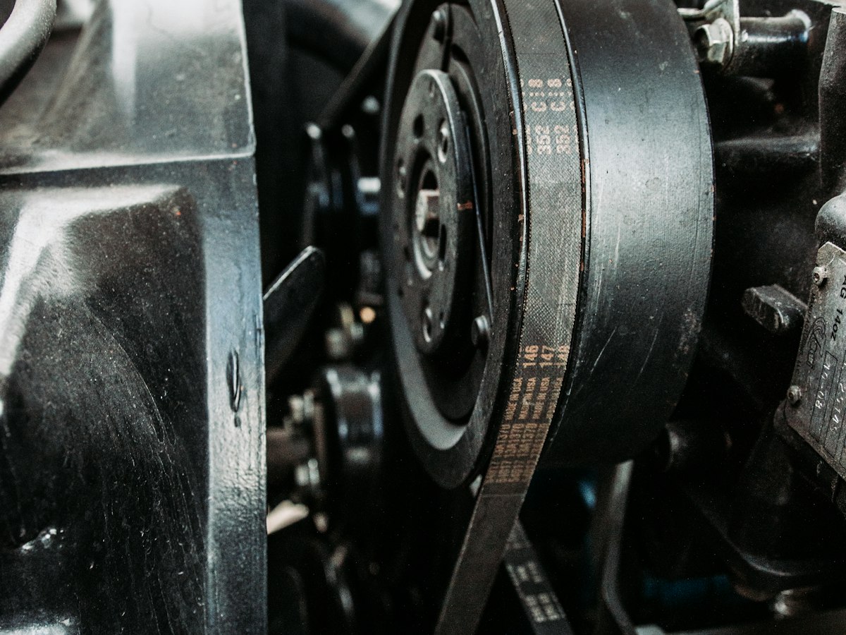 Close-up of an engine belt drive system