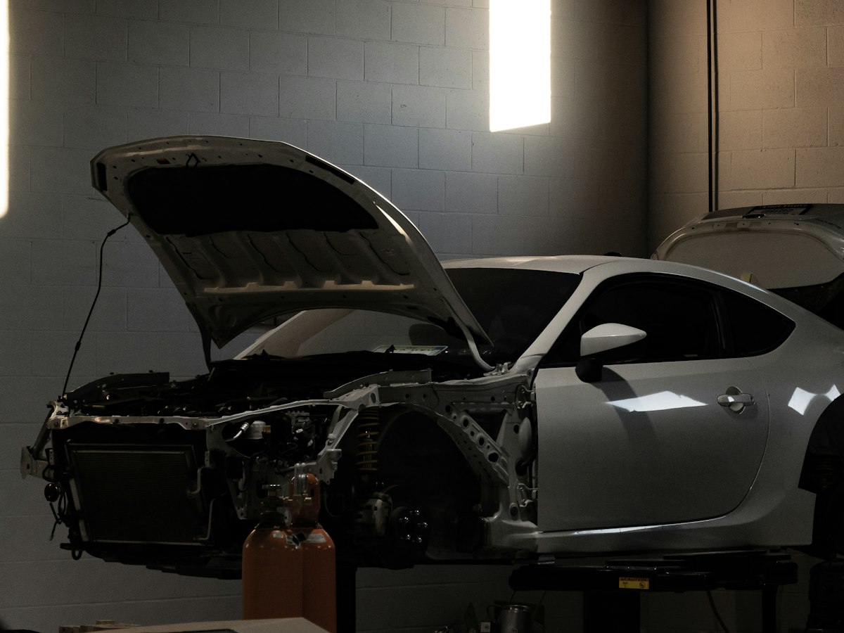 Vehicle stripped down on a lift