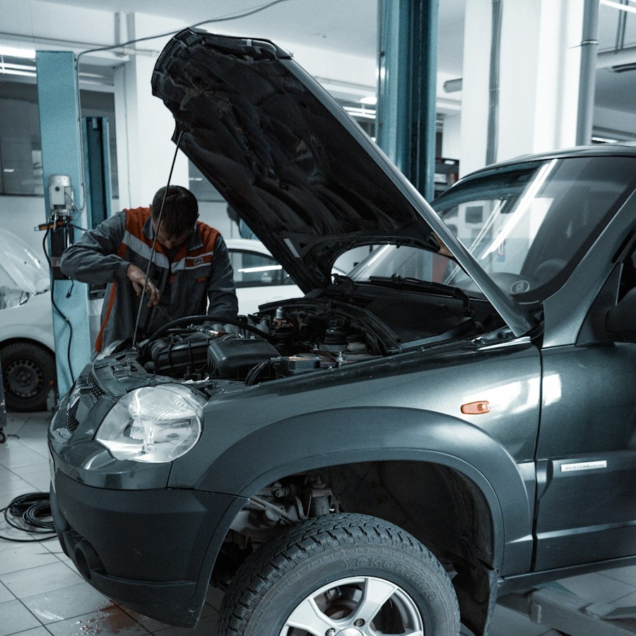 Vehicle raised on a lift with the hood open